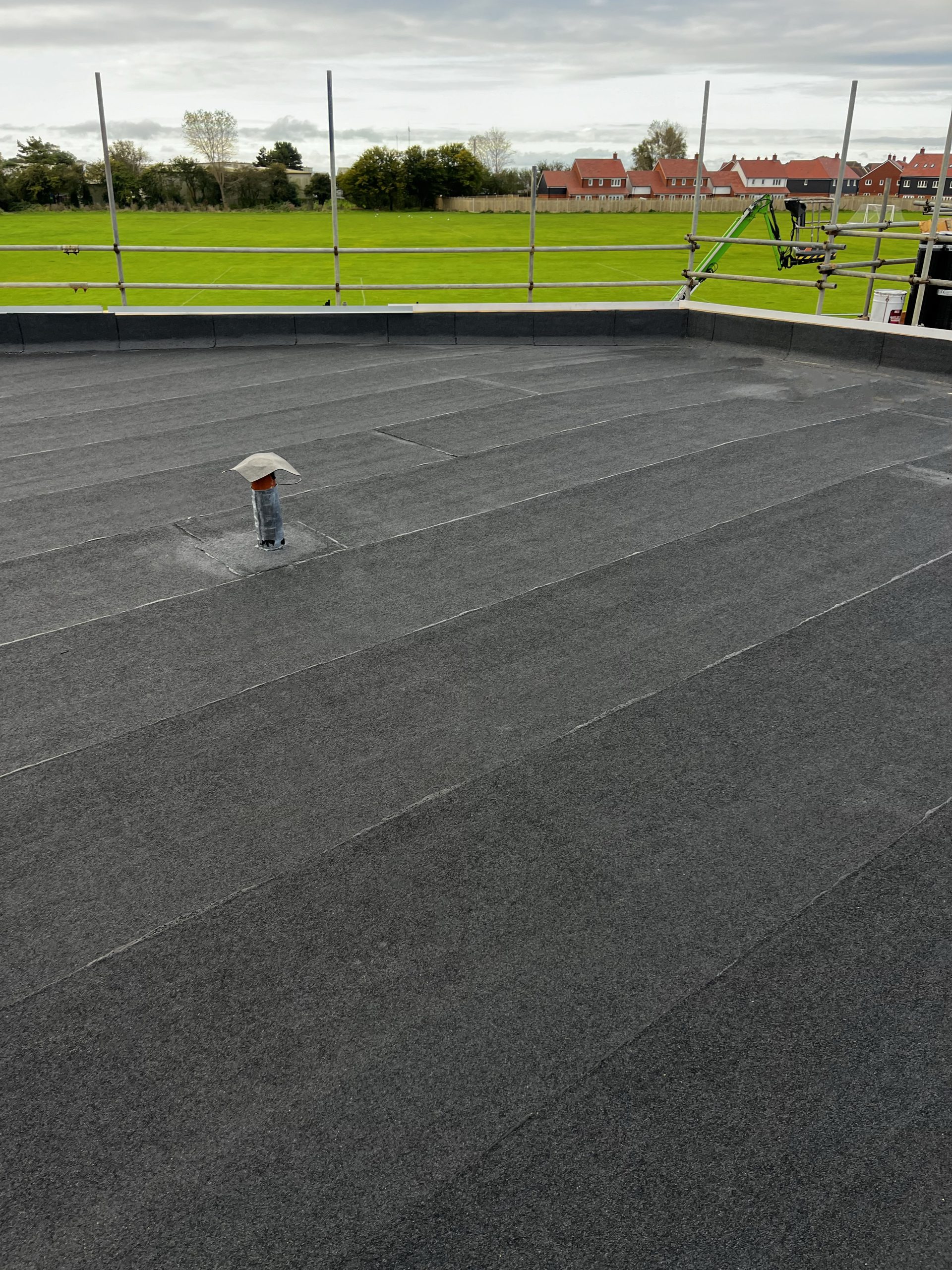 An image of a commercial felt flat roof. AJ Lucas Roofing Contractors Serving Kent, London & South East