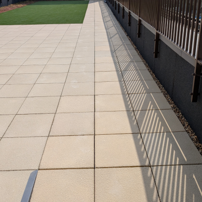 Hot Melt Roofing South East – rooftop terrace with paving slabs installed over hot melt system