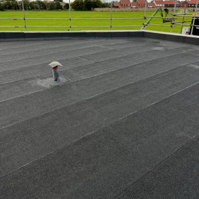 An image of a felt roofing system on a flat commercial roof. AJ Lucas Roofing | Roofing Contractors South East & London